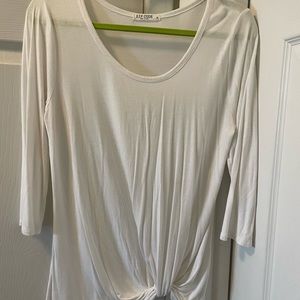 White 3/4 sleeve Zip Code ladies top.